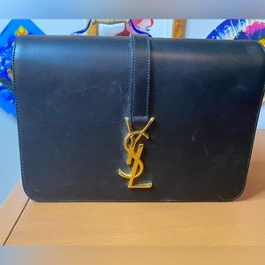 - Saint Laurent classic monogram leather bag